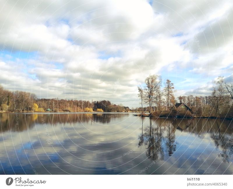 Cloudy sky reflected in small moor lake Bog Lake idyllically Idyll Panorama (View) silent sunshine Winter mood reflection Clouds in the sky