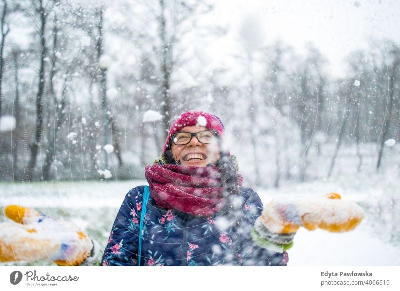 Scarf mitten and hat. Nature covered snow. Happiness. Exciting