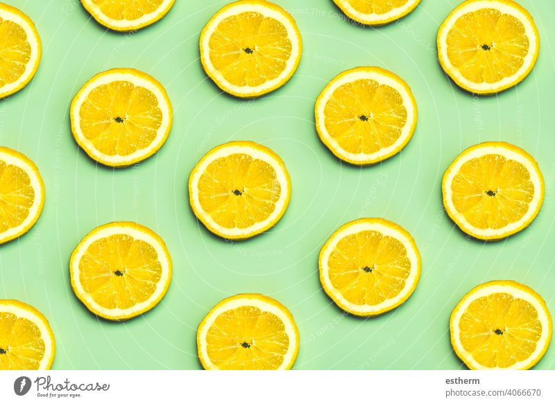 Top view of creative pattern made of lemons slices lemon slice natural fruit citrus food healthy fresh summer background yellow sweet texture abstract juice