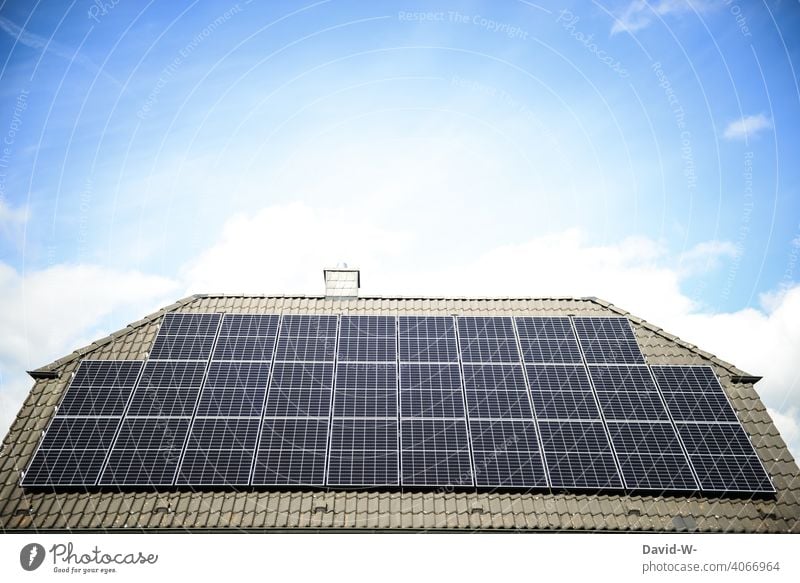 Solar system on a house roof photovoltaics Climate heat source energy saving environmentally conscious photovoltaic system Solar Power technology