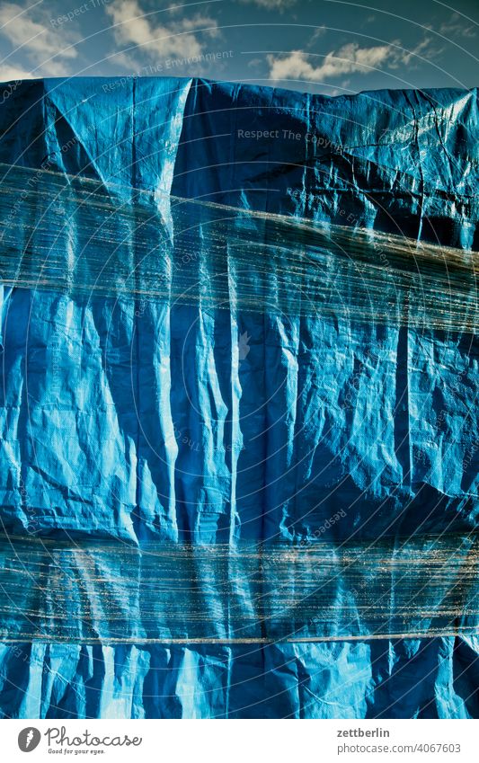 Blue tarp tarpaulin Packing film Packaging wrapped Package Delivery Protection rain shelter Weather protection constricted Material Plastic weave