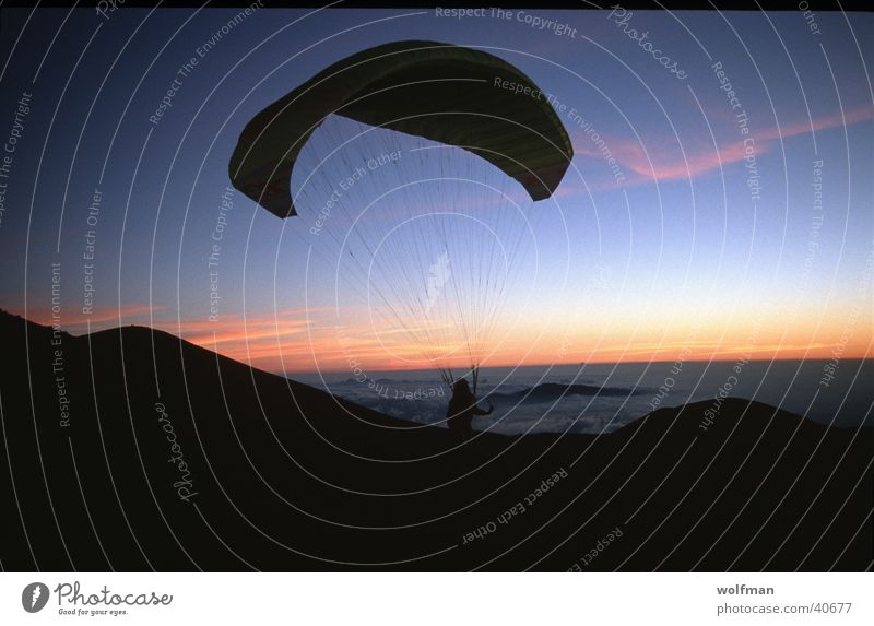 sillouette Paragliding Sunset Hawaii Night Extreme sports paraglider Mauna Kea first flight dawn wolfman wk@weshotu.com