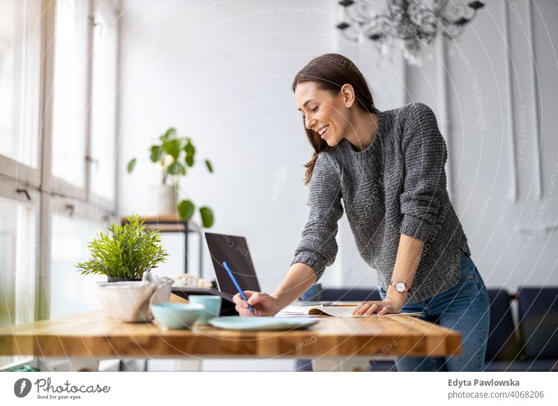 Young female freelancer working in loft office millennials student hipster indoors window natural girl adult one attractive successful people confident person