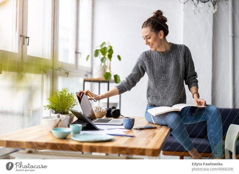 Stylish woman working at her desk