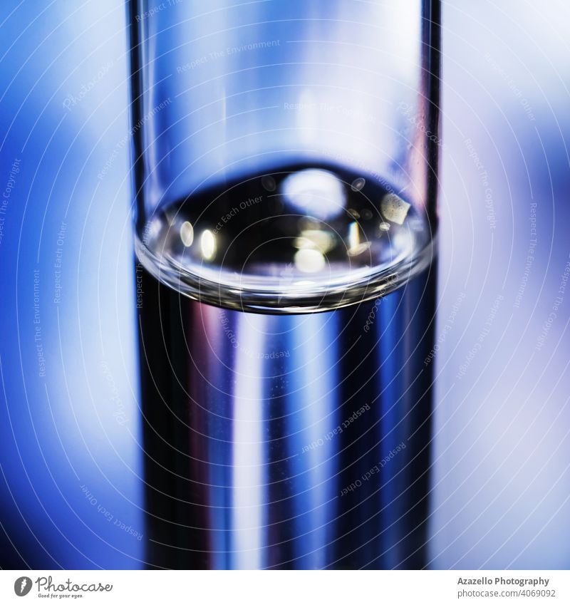 Close up image of a vaccine tube in blue tone air ampoule ampul ampule background biology blur blurry bottle care closeup concept container dose equipment
