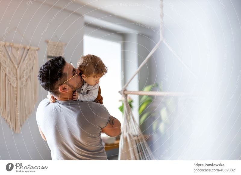 Father playing with his little son at home single parent single dad fathers day fatherhood stay at home dad paternity leave modern manhood family child house