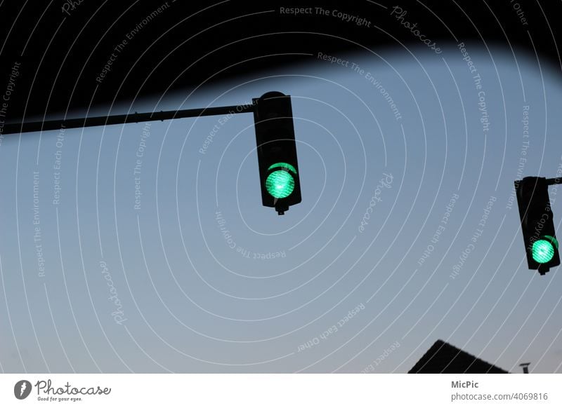 Green light - two green lights Traffic light Light Transport Road sign Exterior shot Colour photo Road traffic Traffic infrastructure Town Motoring Twilight