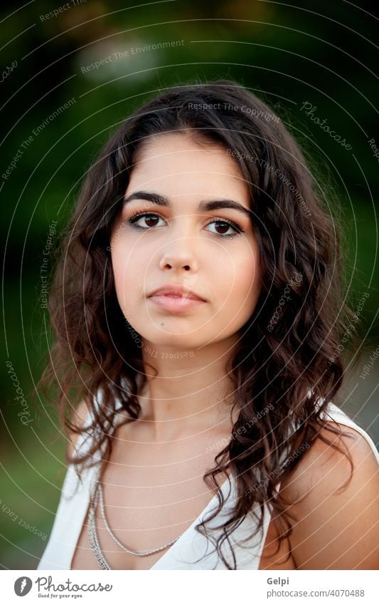 Attractive Young Lady Poses To Photographer. Outside. Model Stock Photo,  Picture and Royalty Free Image. Image 115629262.
