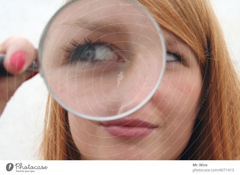 Woman Looks Coins Magnifying Glas Stock Photo by ©Liubomyr