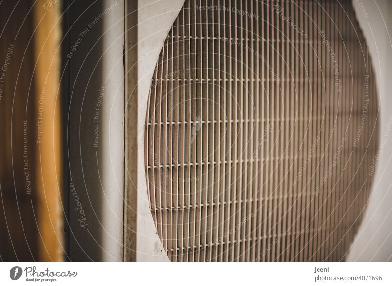 Fan of an air heat pump - side view | ecological, sustainable, modern and environmentally friendly heating system Air source heat pump Modern Sustainability