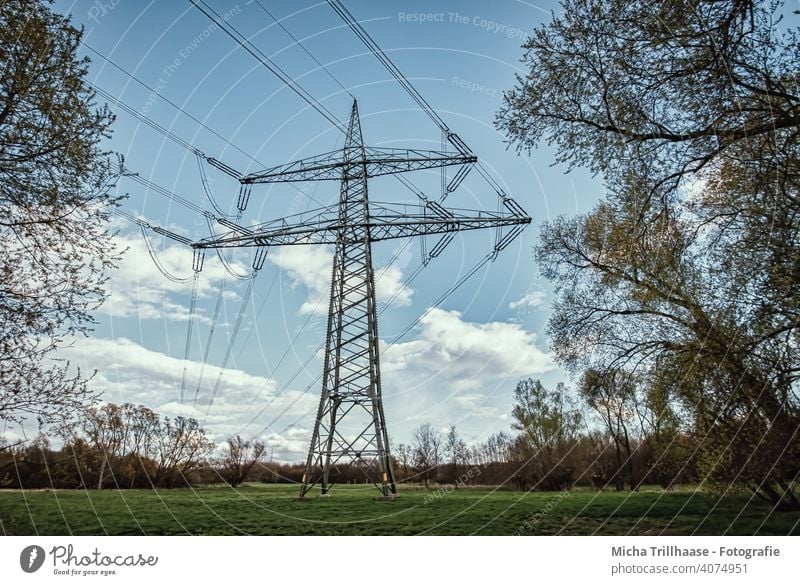 Power pole and power lines in the landscape Electricity pylon High voltage power line Power lines Energy industry Technology Power transmission Cable