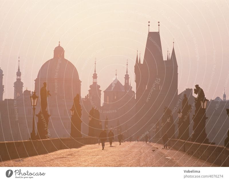 Charles Bridge in Prague off Czech Republic Europe Old town Tower spires Architecture Morning in the morning Haze morning sun