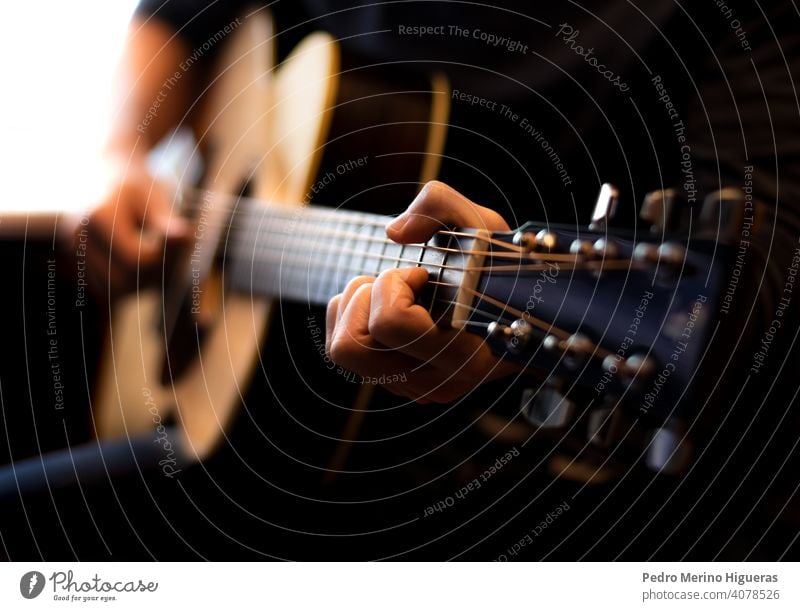 Man Playing A White Electric Guitar Close Up A Royalty Free Stock Photo From Photocase