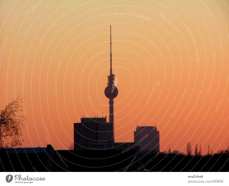 Television tower in the firestorm Vantage point Photographic technology Berlin TV Tower Dusk alex forum hotel
