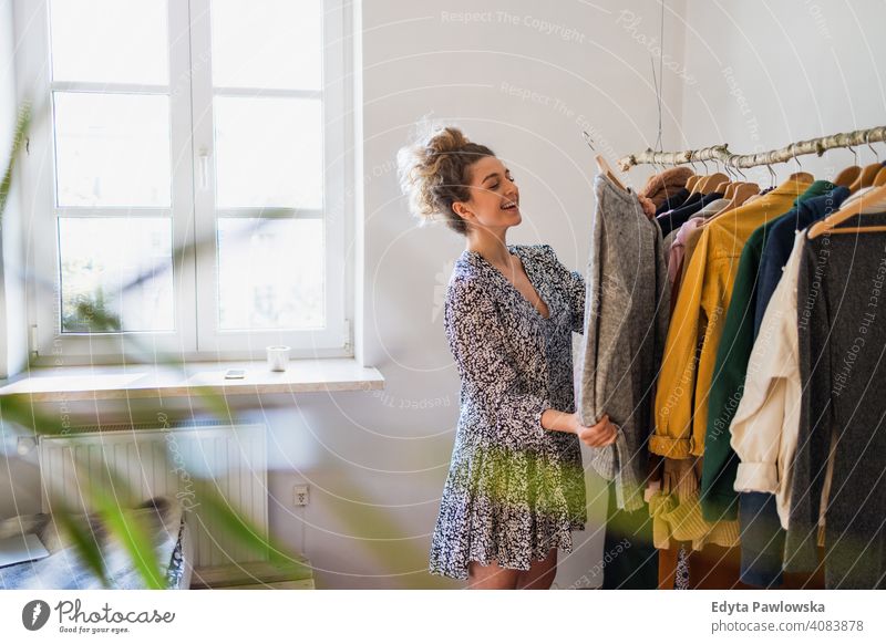 Woman Choosing Clothes in the Shop · Free Stock Photo