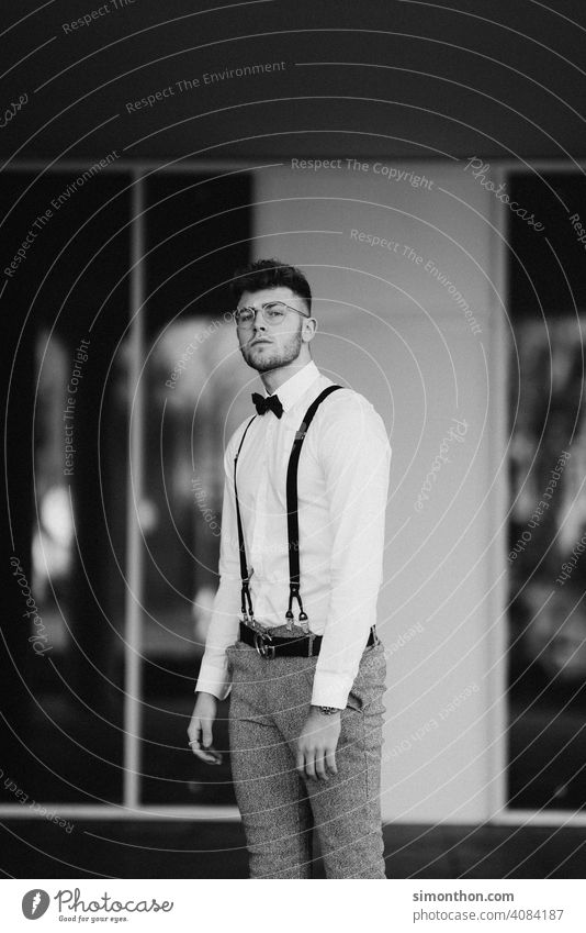 model Clock Exterior shot Modern pretty Hair and hairstyles Style Suspenders Shirt Cool (slang) Guy Looking successful gentleman Black and white photography