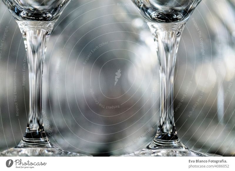 Wine Glass at the exhibition on the table. wedding decor repetition restaurant glass toast celebration alcohol empty drink wineglass row pattern people nobody