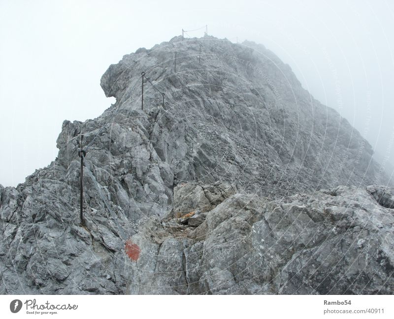 The way Mountain Heilbronner Weg near Oberstdorf approx. 2400m height 7 degrees Fog gusty wind up to 40 Km/h