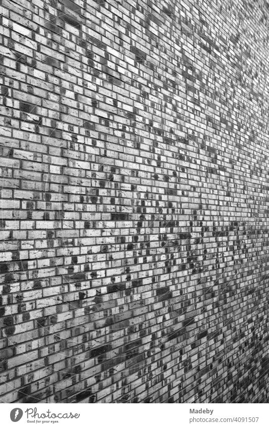 Old clinker brick facade in the Hanauer Landstraße in the Ostend of Frankfurt am Main in Hesse, photographed in neo-realistic black and white Facade