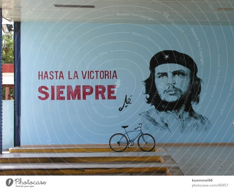 Hasta la Victoria Siempre Wall (building) Painting and drawing (object) Bicycle Bus terminal Cuba South America che guevara Drawing Reunification Blue