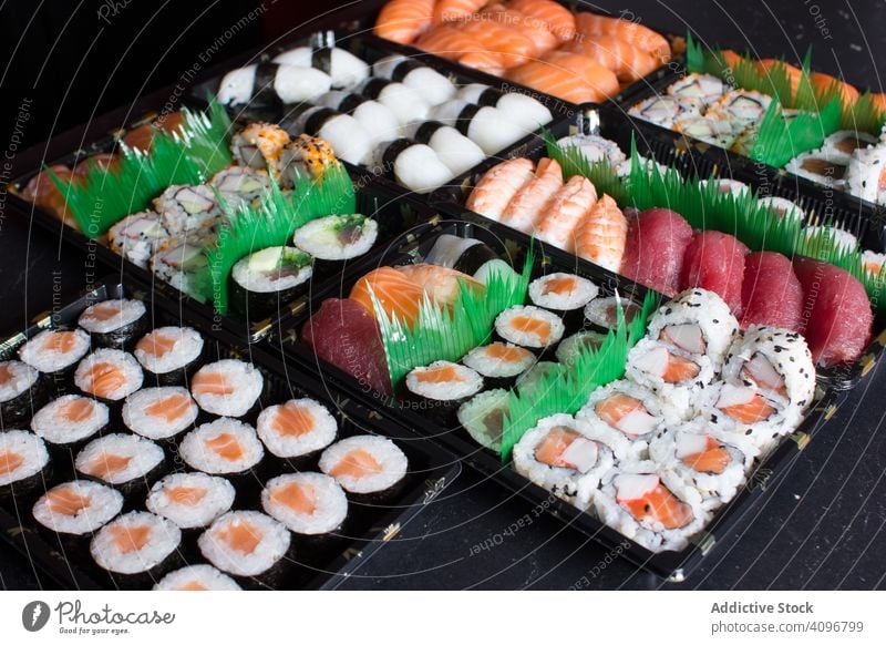 Tasty sushi served in a table rolled up Sushi Plate above asia asian background chopstick fish food fresh gourmet healthy japan japanese japanese sushi