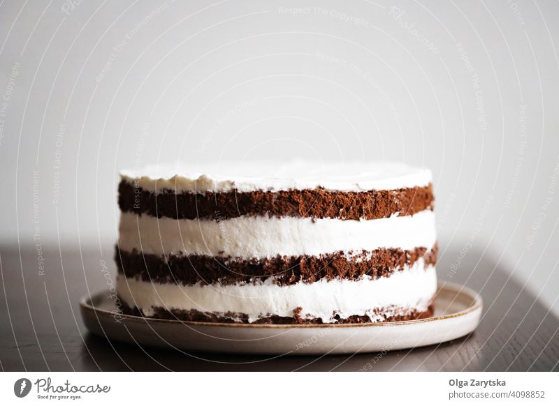 Three layers of chocolate cake with a whipped cream filling. Chocolate Cake Cream cute sponge cake Food Self-made Dark biscuits Tasty Brown Dessert Cooking