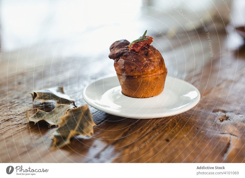 Plate with muffin on wooden table plate vegetable food homemade baked snack tasty yummy breakfast tomato dinner eating appetizing handmade culinary finger food