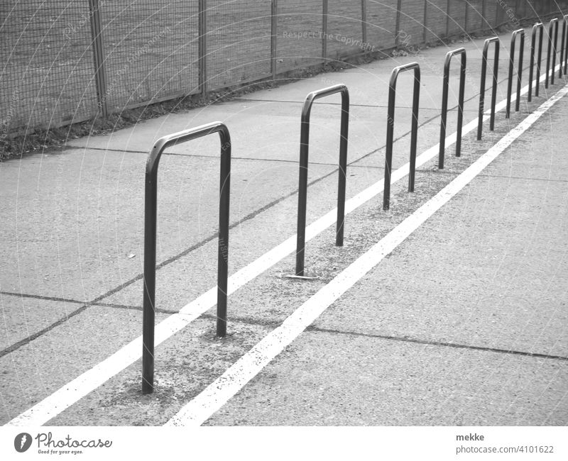 Barriers everywhere Fence off Right ahead Boundary Cycle path Line Structures and shapes Berlin Many Exterior shot Black & white photo Fences Metalware Grating