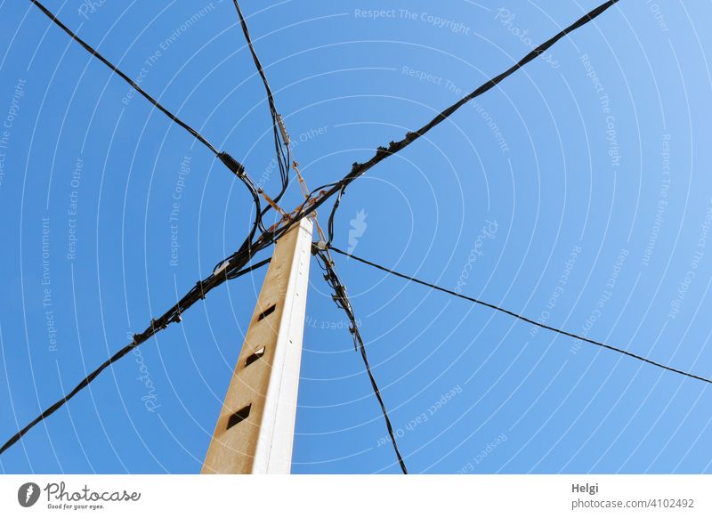 mediterranean power supply - mast with different power cables in front of blue sky stream Electricity pylon Cable Transmission lines Power lines Sky Blue