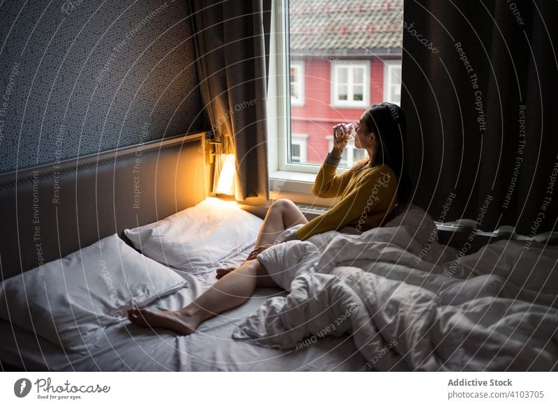 Above View Of Relaxed Woman Sleeping In Bed At Night Stock Photo