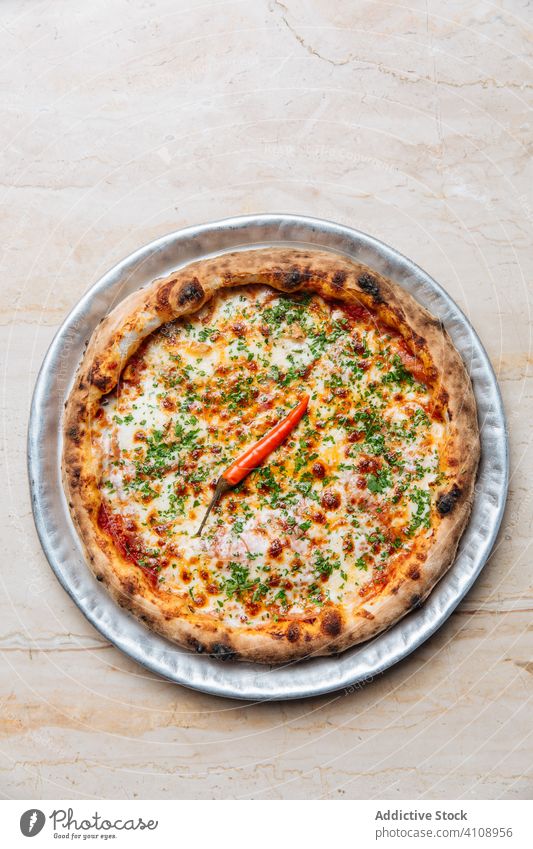 Juicy pizza with cheese and chopped oregano delicious cafe cayenne pepper new york style sauce baked parsley tomato simple spicy green savory crust herb