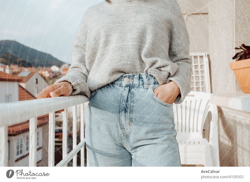 Close up of a woman wearing mom jeans with copy space during a bright day, fashion and styling concept person female elderly retirement senior smile aged happy