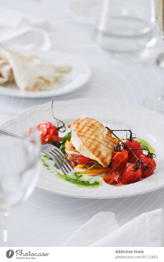 Roasted chicken with vegetables and cherry tomatoes restaurant plate for serve fried dish food delicious meal gourmet tasty dinner cuisine fresh nutrition lunch