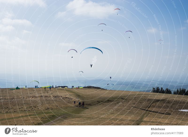 Easter Saturday with the paragliders on the Wasserkuppe Paragliding Flying Sky Freedom Paraglider Leisure and hobbies Exterior shot Sports Aviation Air Mountain