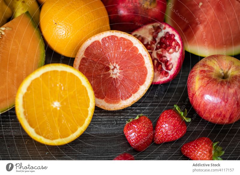 Assorted ripe fruits on wooden table healthy assorted vitamin summer season bunch colorful various fresh lumber food organic natural timber vegetarian diet raw