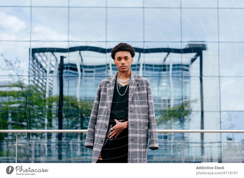 Stylish african american gentleman in elegant black jacket