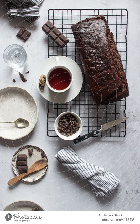 Delicious cake and tea on table ingredient dishware banana banana cake chocolate composition sweet dessert food breakfast natural fresh cup delicious beverage