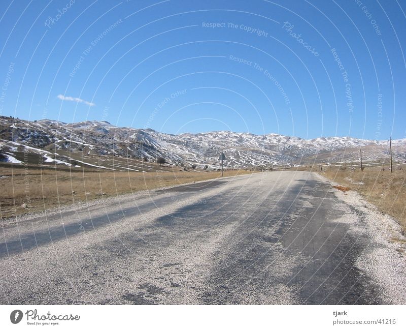 road into nothing Far-off places Summer Turkey Country road Europe Street Mountain Infinity Snow Loneliness
