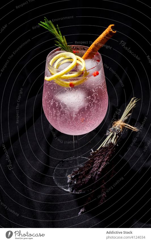 Gin tonic cocktail with pink tonic water gin tonic alcohol ice drink lemon beverage glass cold Pub bar liquid Tonic fruit alcoholic liquor green orange