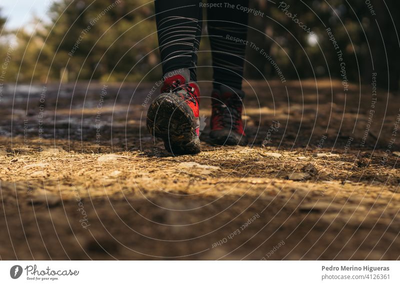 Close- up of hiking boots walking in the mountain travel nature copy space adventure trekking hiker shoe healthy lifestyle summer active exercise people foot