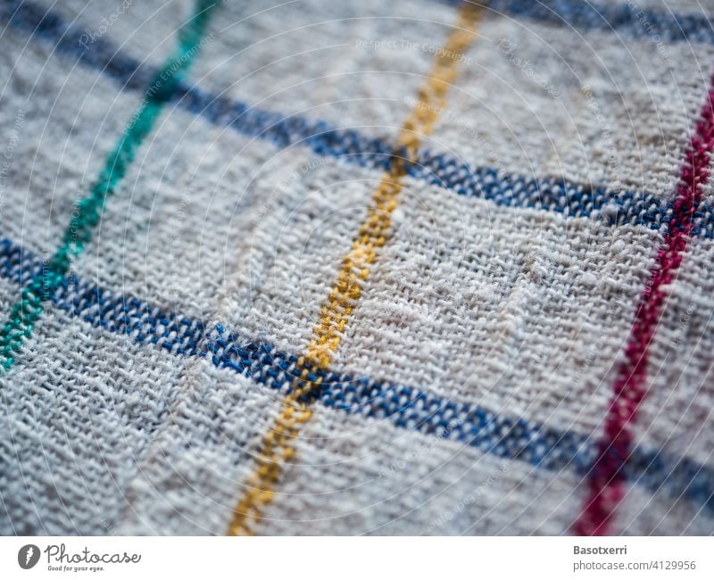 Macro shot of a classic white kitchen towel with pattern of blue, red and green lines Kitchen boil Rag Woven Cloth White Blue Red Green Bright