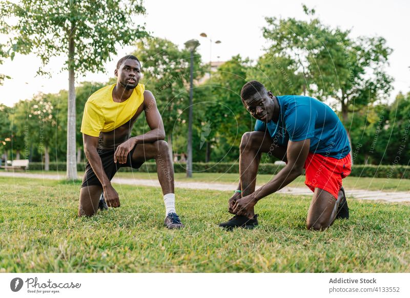 Black athletic men resting in the park work lifestyle break adult relax people person comfortable man free relaxation leisure tired fatigue calm exhausted male
