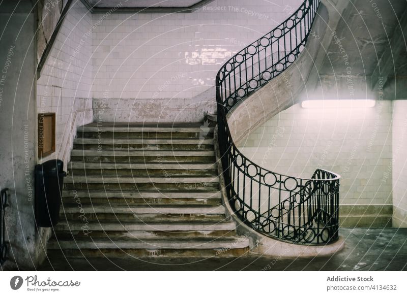 Ornamental staircase in old building interior shabby house stairway railing tile wall ornament hall stone metal porto portugal step structure grunge design