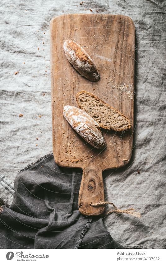 Tasty bread on cutting board delicious kitchen baked fresh piece slice crispy cuisine nutrition homemade tasty wooden chopping board culinary rustic snack