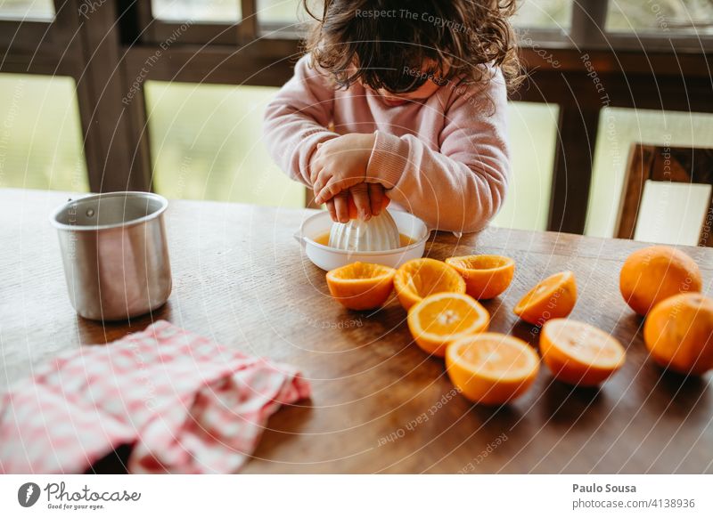 Child making orange juice at home 1 - 3 years Caucasian Orange Orange juice Colour photo Human being Juice Infancy Fruit Healthy childhood Juicy Food