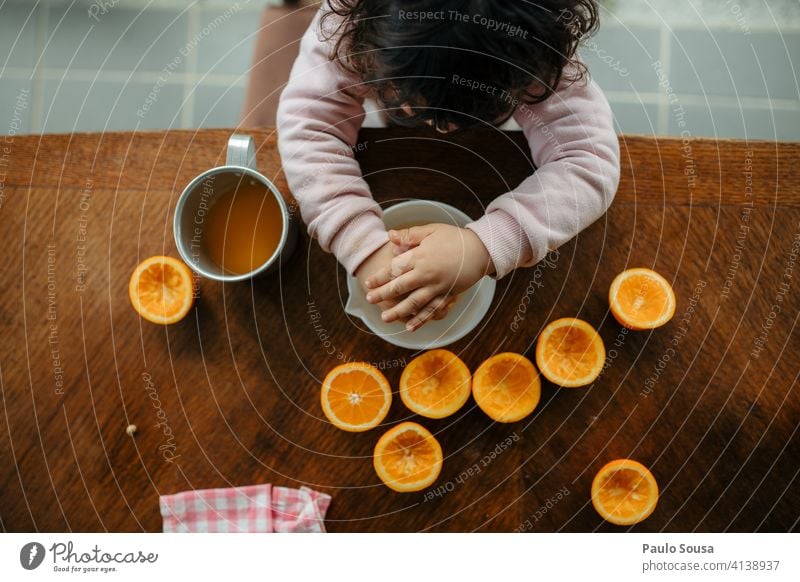 Child making orange juice at home 1 - 3 years Caucasian Bird's-eye view view from above Orange Orange juice citrus Vitamin Vitamin C Fruit Juice Citrus fruits