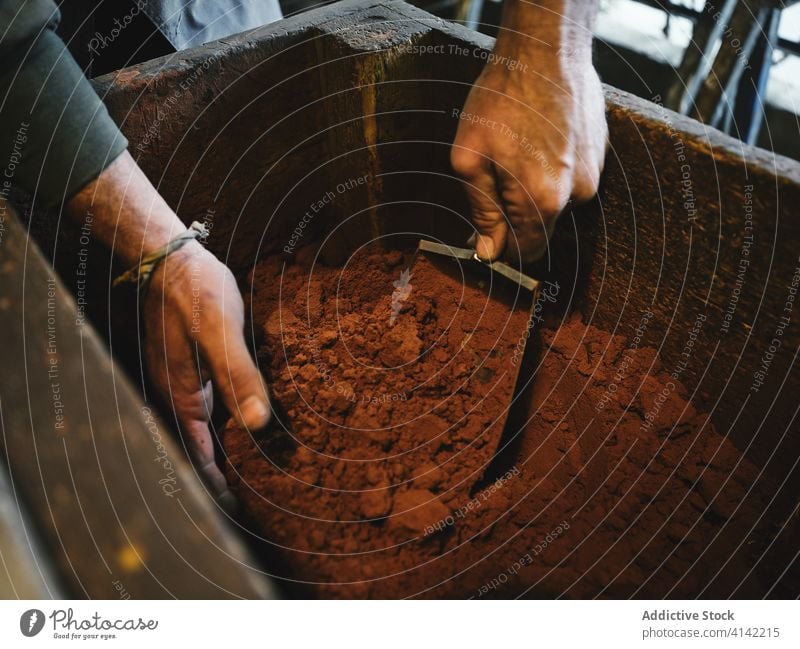 Professional master using sand during metal casting process goldsmith mold fill work workshop equipment tool add put man craft professional job pattern
