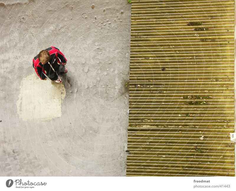 from above Bird's-eye view Corrugated iron roof Concrete Two-piece Man Derelict Human being
