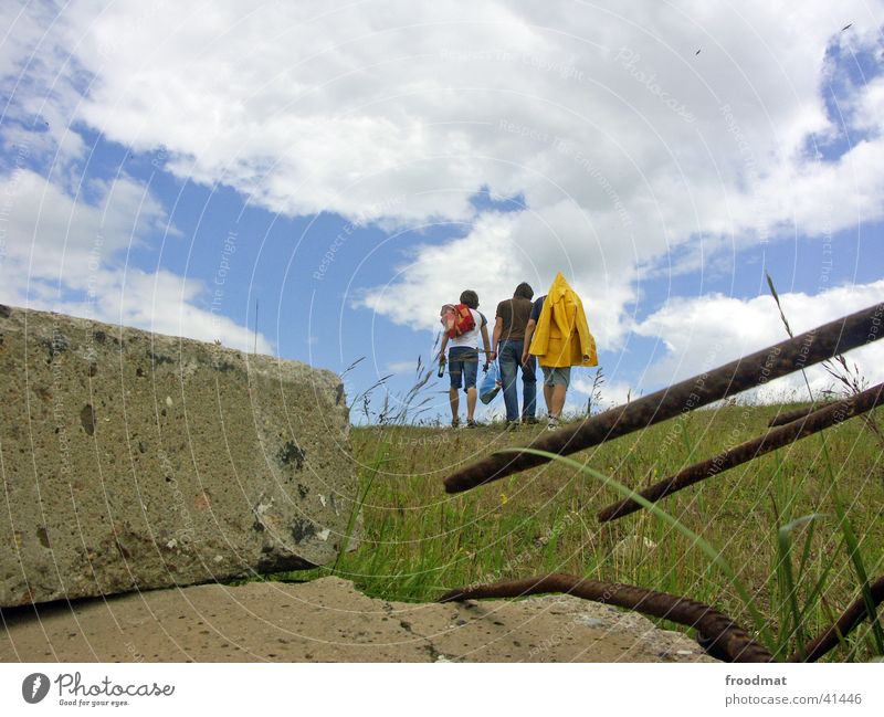 The three of them and me behind the stone. Rain jacket Summer Clouds Concrete Hill Meadow Leisure and hobbies Music festival Berlinova 2004 Blanket Mountain Sky