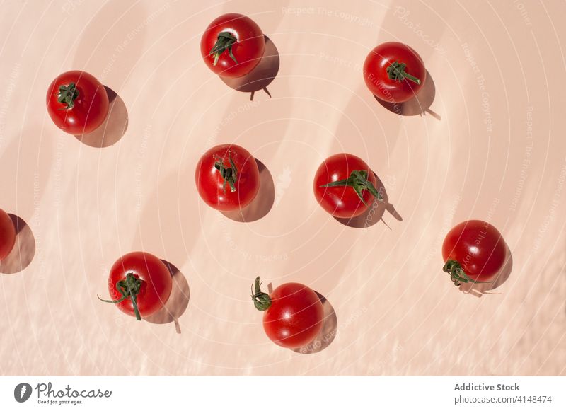 Fresh red tomatoes on table cherry ripe fresh natural organic food vegetable vegetarian vitamin ingredient healthy raw vegan nutrition bright delicious colorful